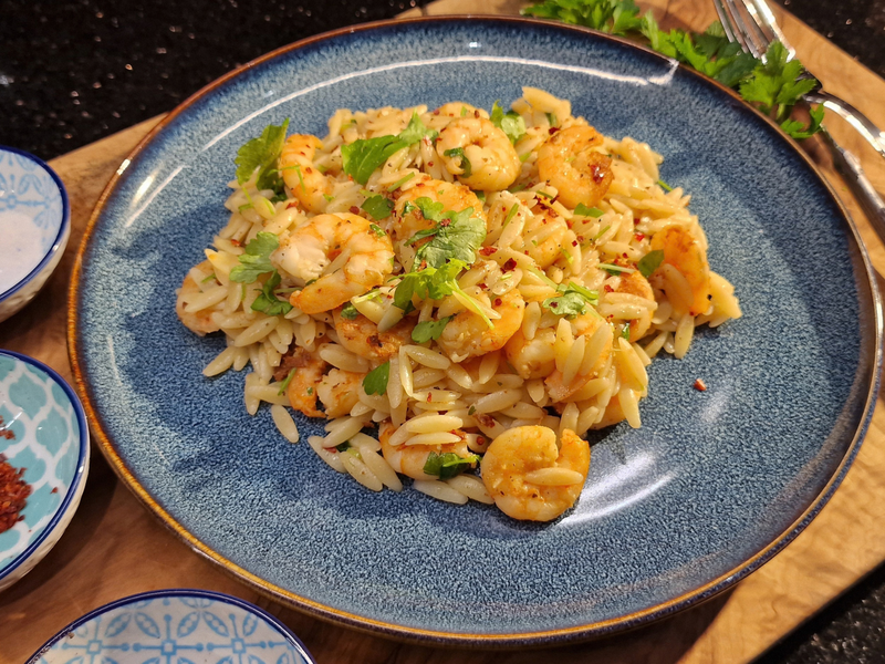 Shrimp on kritharaki noodles in a lemon garlic sauce