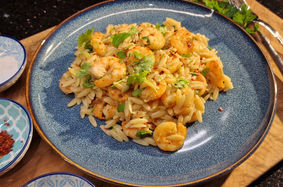 Shrimp on kritharaki noodles in a lemon garlic sauce